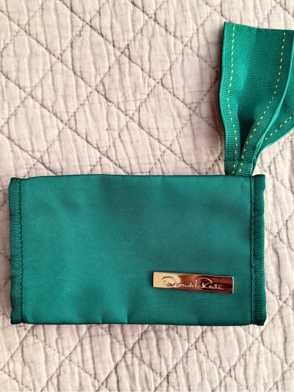 Oscar de La Renta green makeup bag